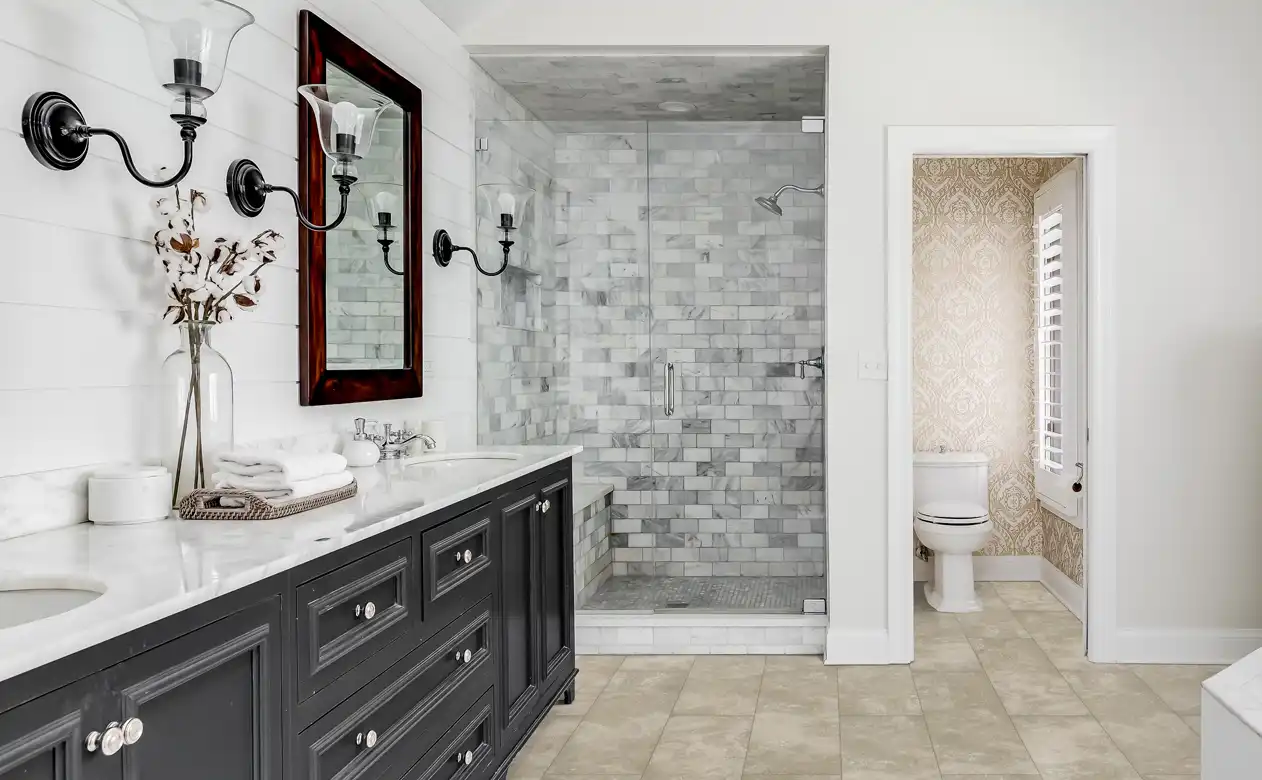 Grey tiled shower in tile bathroom 
